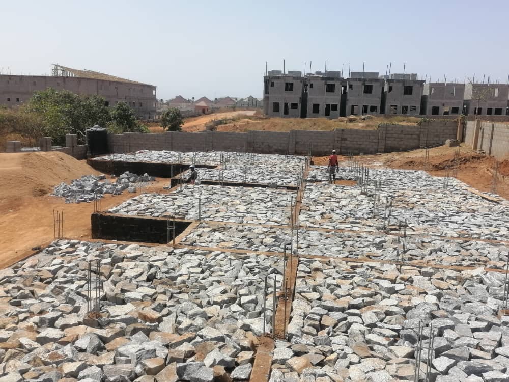 Construction site with foundations and framing